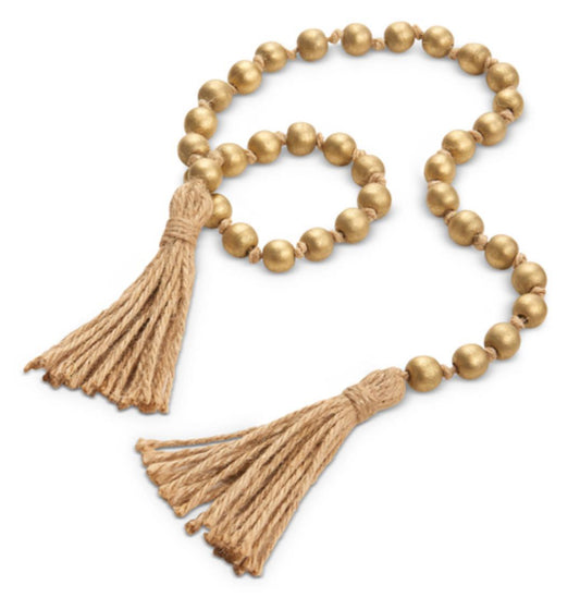 Gold beads with tassels
