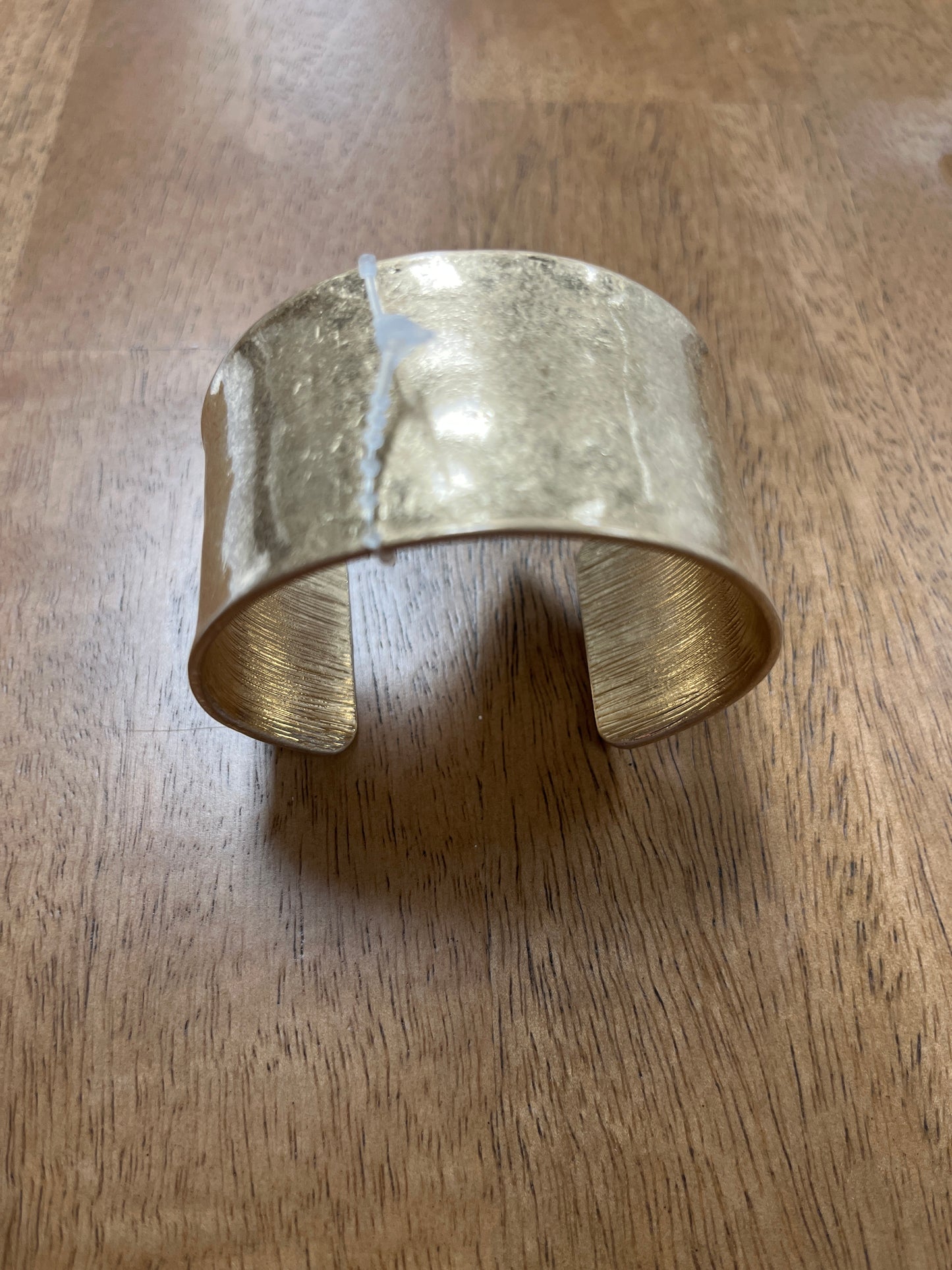Worn 1.25” wide cuff bracelet