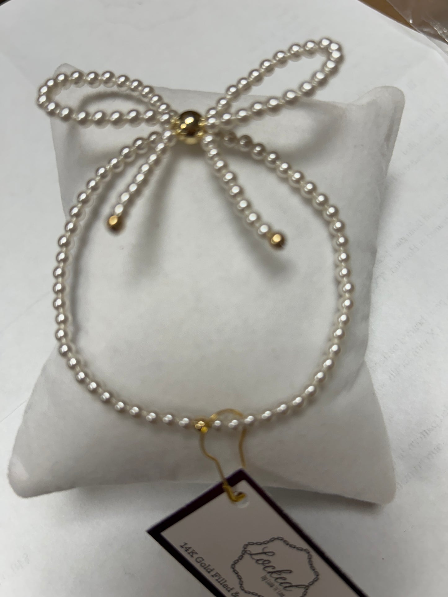 Pearl Bow Bracelet with Gold Accents