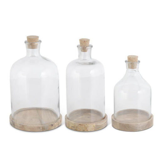 Glass bottle cloches with wood bottom