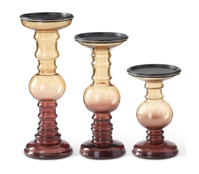 Brown & burgundy glass candleholders with gold