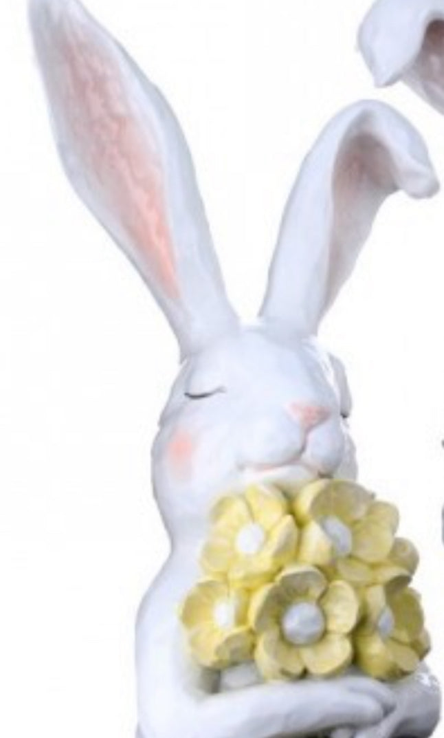 12” resin thoughtful bunny with flowers