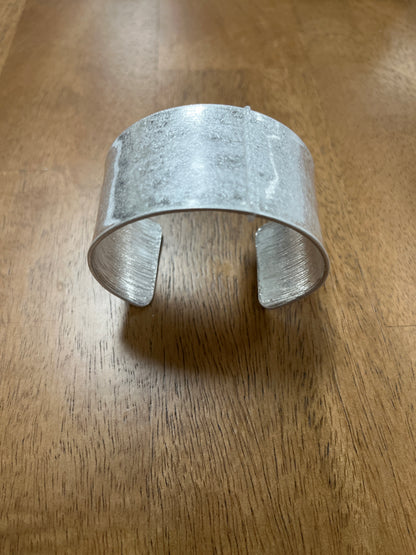 Worn 1.25” wide cuff bracelet