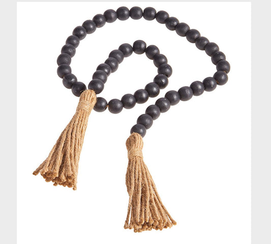 black beaded garland with tassels