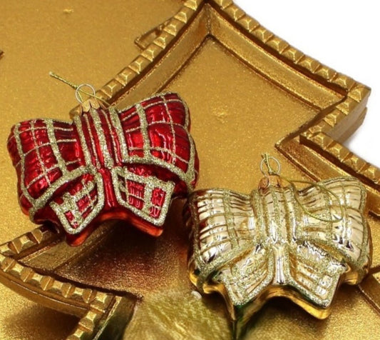 Blown glass bow ornament with gold glitter
