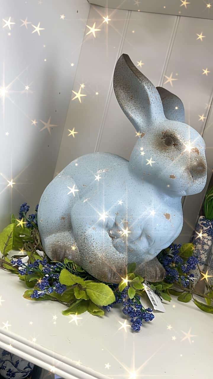 Weathered blue terrecota rabbits