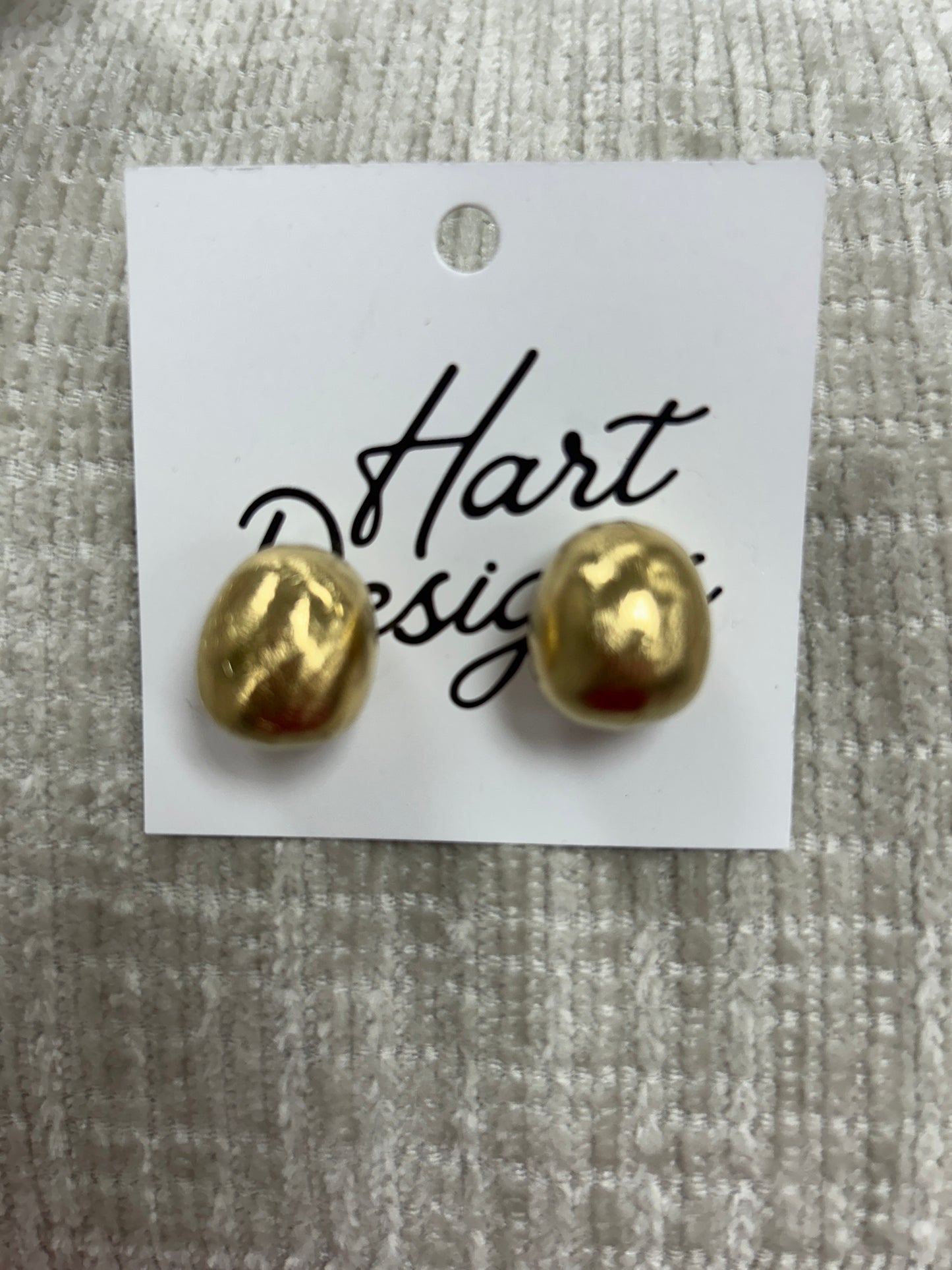 Golden stud earrings