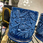 Blue and white mug with gold handle