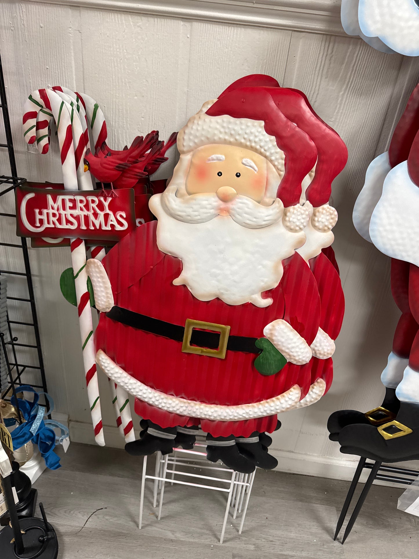 Large metal Santa with candy cane