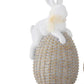 white resin easter bunnies on woven eggs