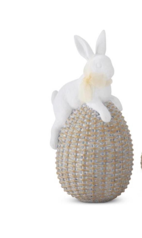 white resin easter bunnies on woven eggs