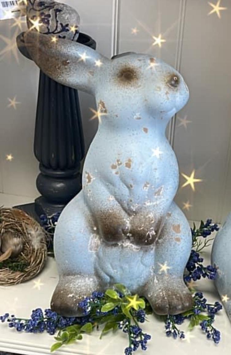 Weathered blue terrecota rabbits