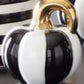 White and black striped ceramic pumpkin with gold stem