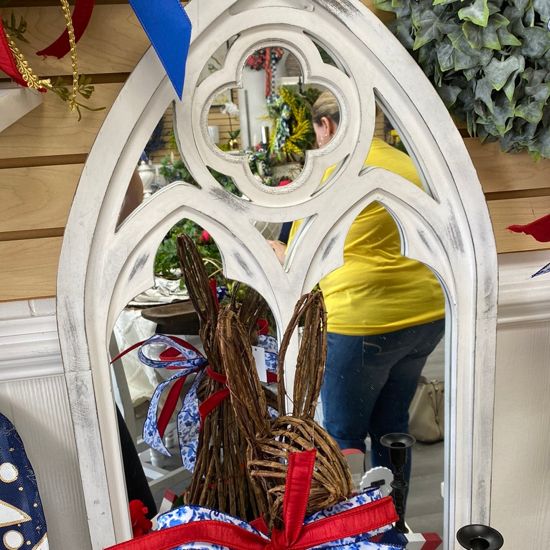 White wooden cathedral mirror