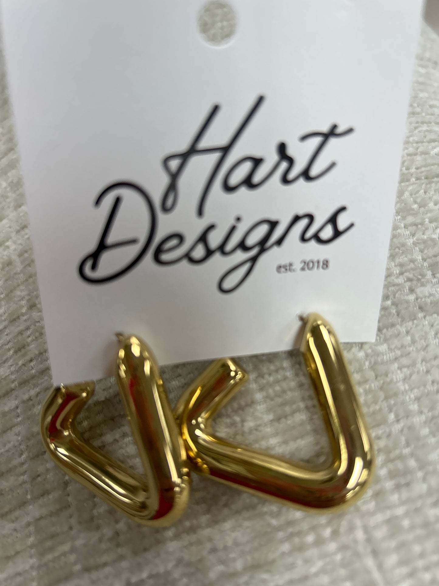 Gold triangle hoop earrings