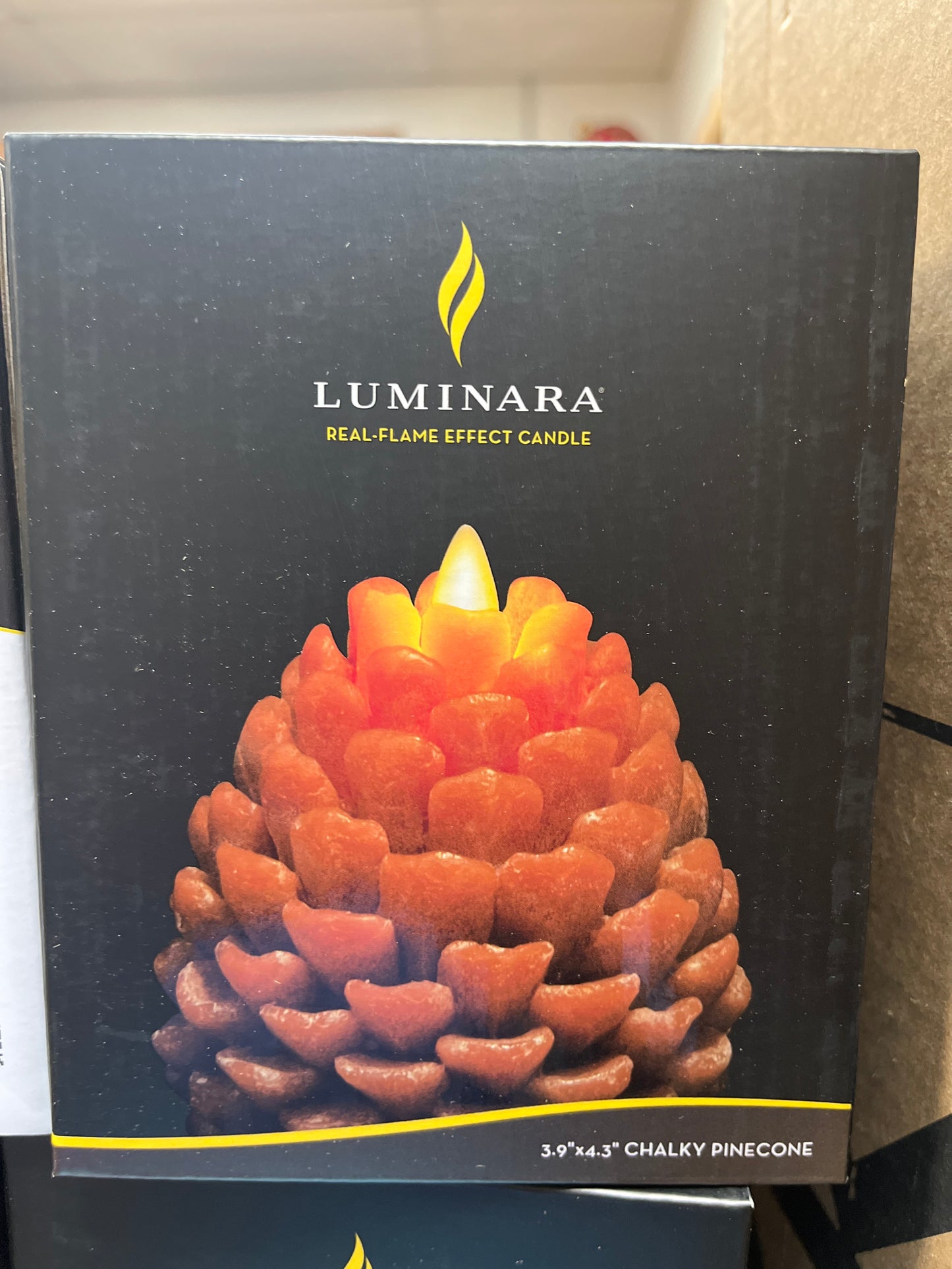 Light brown wax pine one luminara indoor candle