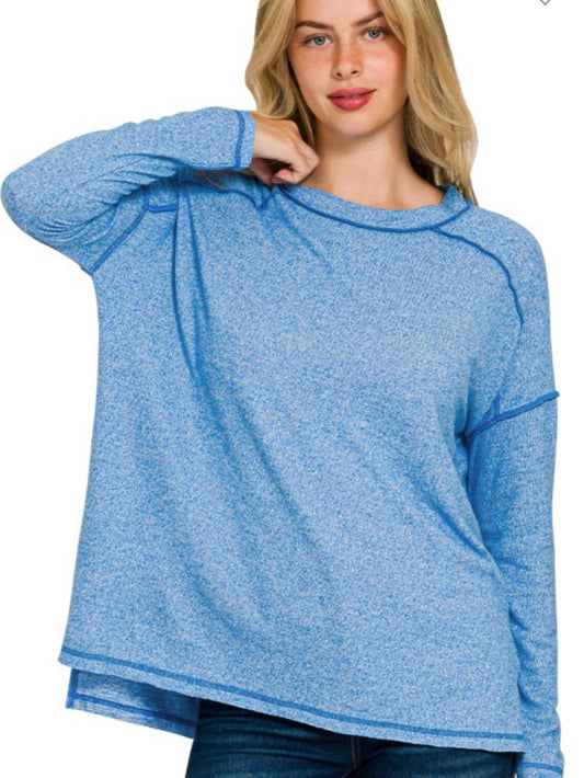 Soft melange hi-low exposed seam top