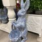 Resin rabbit with floral basket