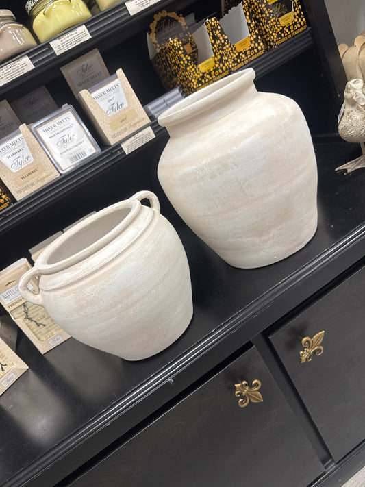 Distressed white vases