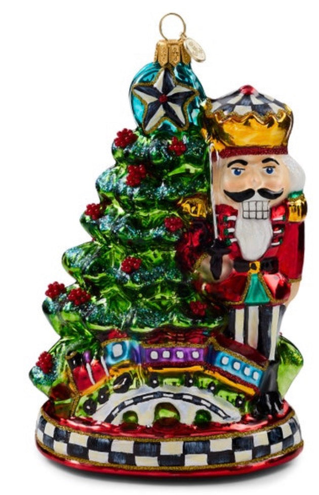 Nutcracker By Tree Glass Ornament