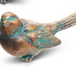 verdigris and bronze birds