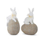 white resin easter bunnies on woven eggs