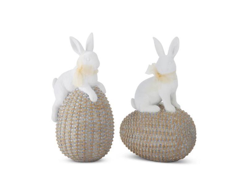 white resin easter bunnies on woven eggs